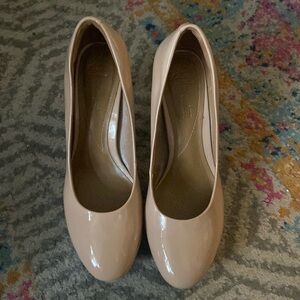 Clarks nude patent pumps